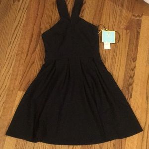 Little black dress with cinched waist and flared skirt. NWT